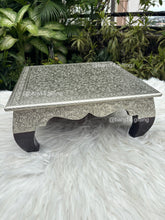 Curved wooden leg chowki