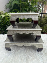 Curved wooden leg chowki