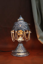 Vintage-inspired decorative lamp with detailed carvings, ideal for festive décor and gifting.