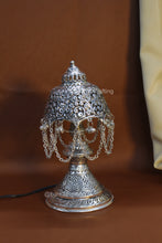 Vintage-inspired decorative lamp with detailed carvings, ideal for festive décor and gifting.