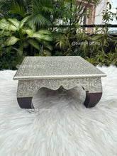 Curved wooden leg chowki