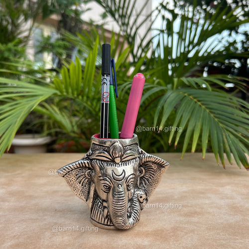Elegant elephant pen stand with intricate detailing, premium office décor and corporate gift idea.