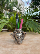 Elegant elephant pen stand with intricate detailing, premium office décor and corporate gift idea.