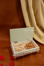 Handcrafted enamel rectangle dry fruit box with peacock motif, stylish mewa box for Diwali, weddings, and corporate gifting.