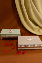 Handcrafted enamel rectangle dry fruit box with peacock motif, stylish mewa box for Diwali, weddings, and corporate gifting.