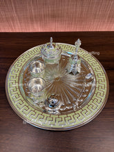 Handcrafted enamel pooja thali set including thali, katoris, ghanti, agarbatti stand, and dabbi, essential for Diwali, Navratri, and daily prayers