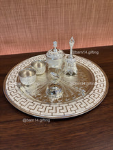 Handcrafted enamel pooja thali set including thali, katoris, ghanti, agarbatti stand, and dabbi, essential for Diwali, Navratri, and daily prayers