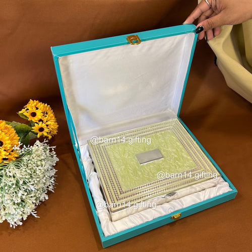 Silver-plated glitter dry fruit box with elegant textured design, ideal for festive gifting, weddings, and Diwali celebrations. Perfect for serving sweets and dry fruits in style.