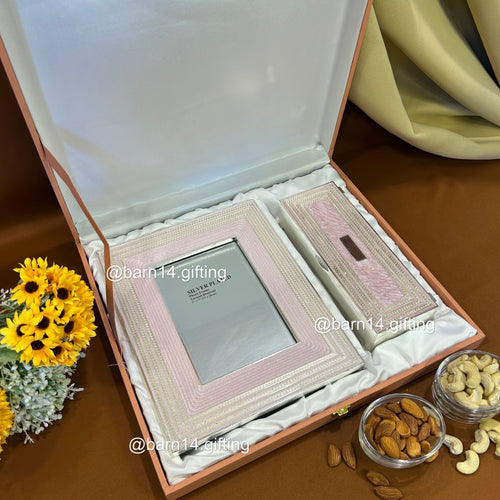 Elegant glitter-finish dry fruit box and photo frame gift set, perfect for Diwali, weddings, and festive gifting. Silver-plated detailing adds luxury and sparkle to celebrations