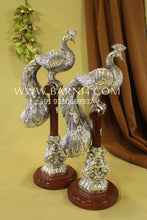 Pure silver peacock on stand