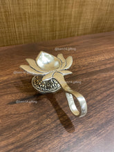 Lotus Aarti Diya in German Silver – traditional lotus-shaped diya for pooja, aarti, Diwali décor, and auspicious gifting.