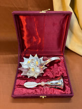 Handcrafted lotus diya with matching pink stone bell, sacred symbols of purity and devotion, perfect for festive hampers and pooja décor.