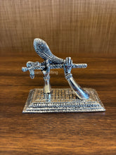 German silver Krishna flute idol with peacock feather – Mohan Basuri stand for spiritual décor and auspicious gifting.