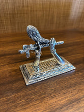 German silver Krishna flute idol with peacock feather – Mohan Basuri stand for spiritual décor and auspicious gifting.