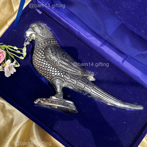 Elegant parrot statue with antique silver look, velvet box packaging, ideal for home décor, spiritual blessings, and premium corporate gifting.