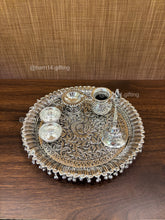 Intricately crafted peacock puja thali set complete aarti plate with diya, katori, kalash, and spoon for daily puja, Diwali, and wedding gifting.