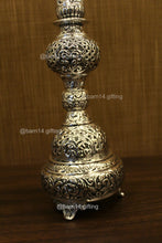Handcrafted silver finish peacock diya stand – auspicious deepam for festivals, housewarming gifts, and spiritual ceremonies.