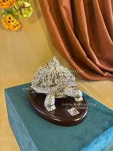 999 pure silver Ashtalakshmi tortoise idol on wooden base, sacred vastu symbol of wealth, stability and prosperity, ideal for home and office.