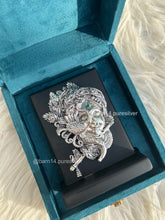 999 pure silver Baal Krishna idol on stand, handcrafted devotional gift symbolizing innocence and divine joy, ideal for baby showers and housewarmings.