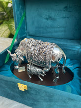 Elegant silver cow and calf figurine mounted on polished wooden base, premium gift for corporate, traditional, and religious occasions.