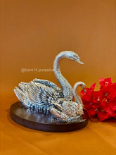 Pure silver mother and baby swan figurine on wooden base – premium wedding, anniversary, and housewarming gift décor.