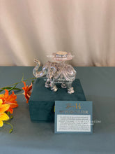 Pure silver gajdeep with rose quartz placed inside velvet gift box