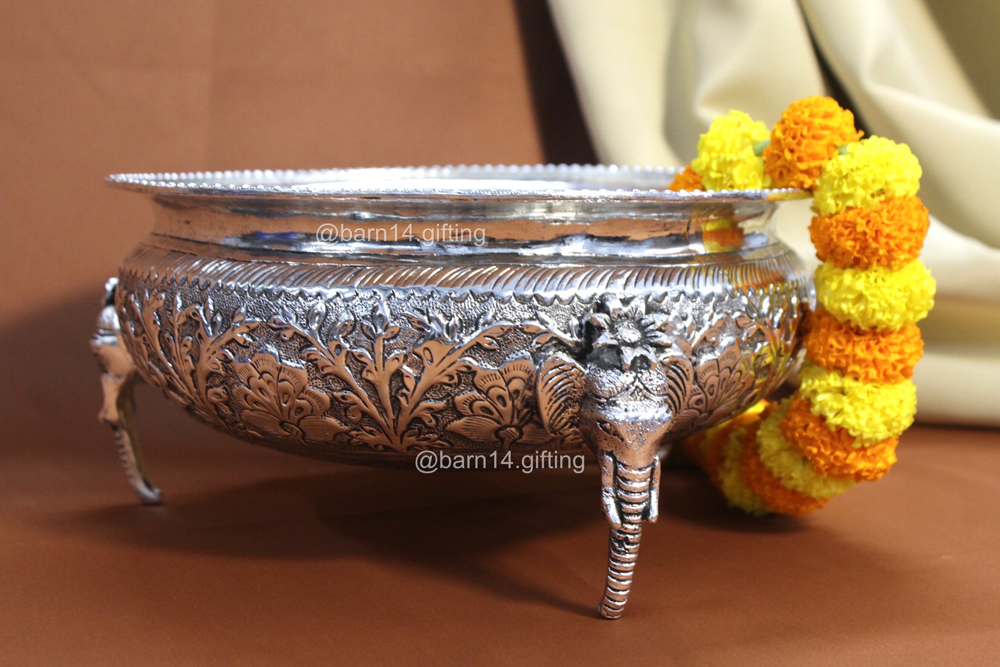 Decorative silver urli with elephant design – luxury housewarming, Diwali, and wedding gift symbolizing prosperity.