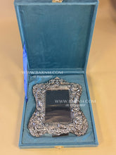 luxury silver plated photo frame with floral design
