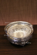 multi-purpose urli bowl with intricate silver-plated design, perfect for festive décor, floral arrangements, and pooja rituals.