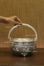 multi-purpose urli bowl with intricate silver-plated design, perfect for festive décor, floral arrangements, and pooja rituals.