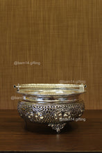 multi-purpose urli bowl with intricate silver-plated design, perfect for festive décor, floral arrangements, and pooja rituals.
