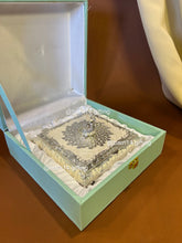 Premium enamel dry fruit box with ornate silver finish and peacock top, luxurious centerpiece and memorable gift for Diwali, weddings, anniversaries, and corporate celebrations.