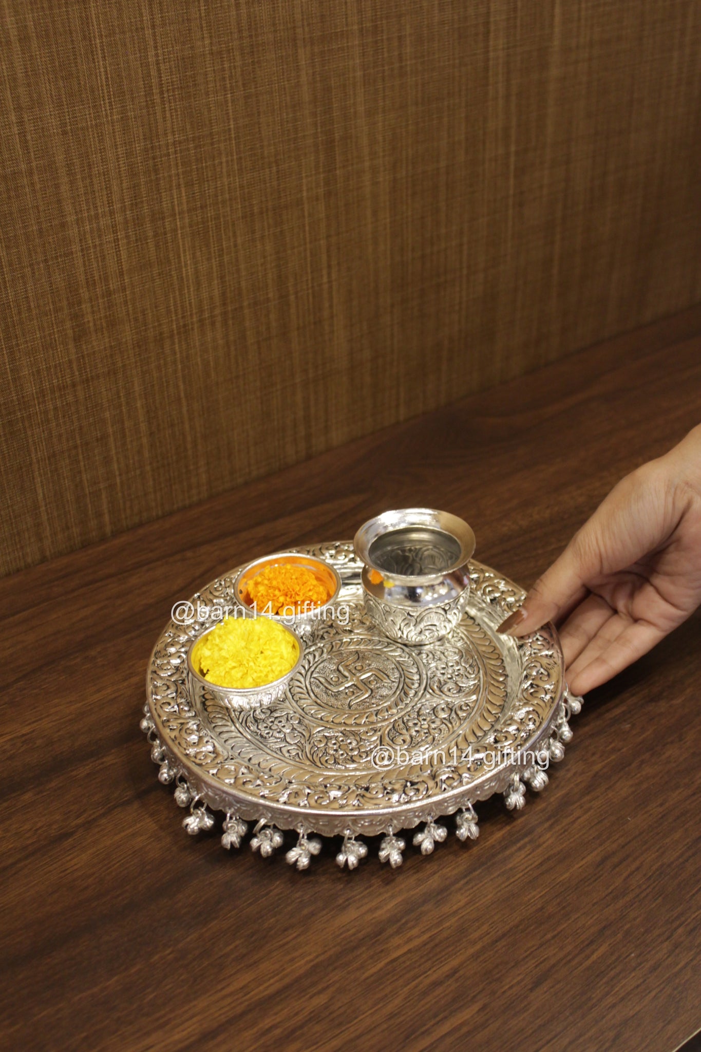 Sacred Swastik design pooja thali set in silver finish, complete with katoris and lota, symbol of purity and devotion for prayers, festivals and religious occasions