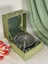 Decorative parrot platter in German silver for serving mewa.