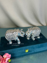 Pure Silver Gajendra Elephant Pair on wooden base.