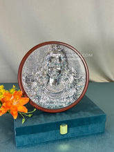 Intricately detailed pure silver Lord Shiva artwork.