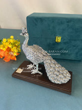 Elegant Pure Silver Peacock Statue for luxury home décor.