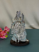 Pure silver Radhe Mohan idol for weddings and auspicious gifting.
