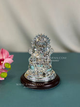 Pure Silver Vinayak idol on wooden base for pooja room.