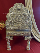 999 pure silver regal chair with intricate detailing